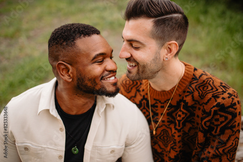 Closeup smiling LGBTQ+ engaged men photo