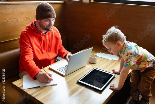 Singe Parent Freelancer at Cafe photo