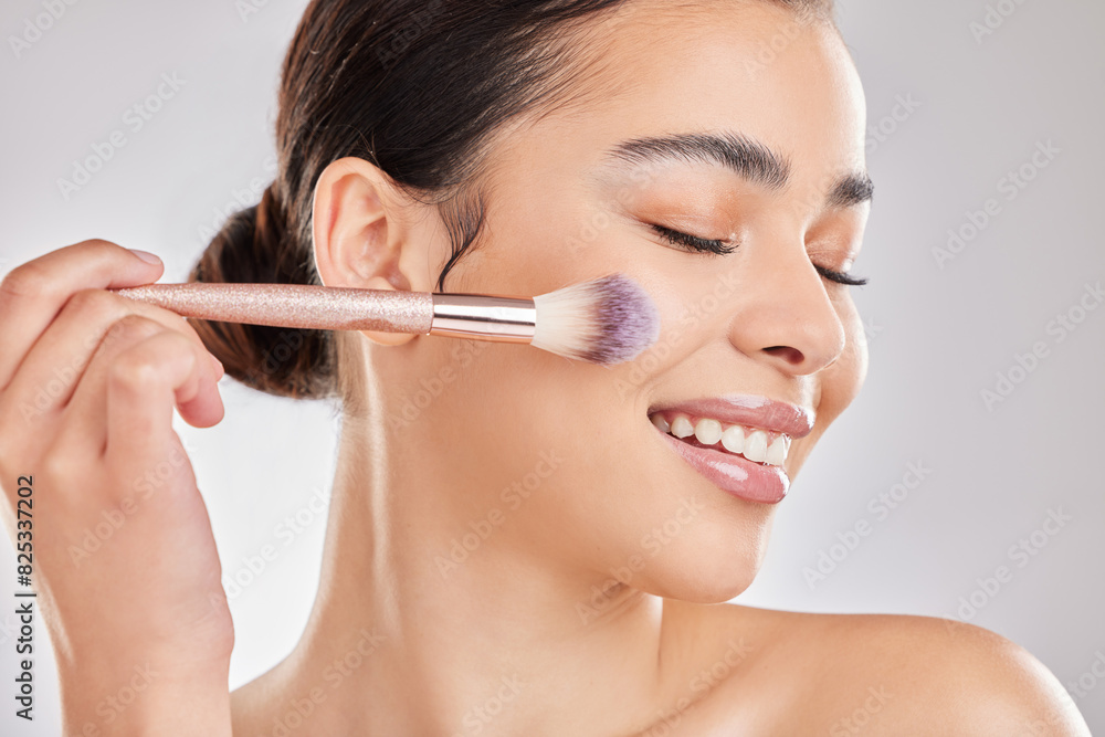 Smile, makeup brush and woman in studio for blush, cosmetics and application on white background. Female person, beauty and tools with happiness for highlight, contour and skincare with eyes closed Smile, makeup brush and woman in studio for blush, cosmetics and application on white background. Female person, beauty and tools with happiness for highlight, contour and skincare with eyes closed