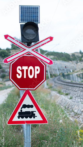 stop sign on the railroad