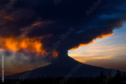 Sunset with fumaroles from the Popocatepetl volcano