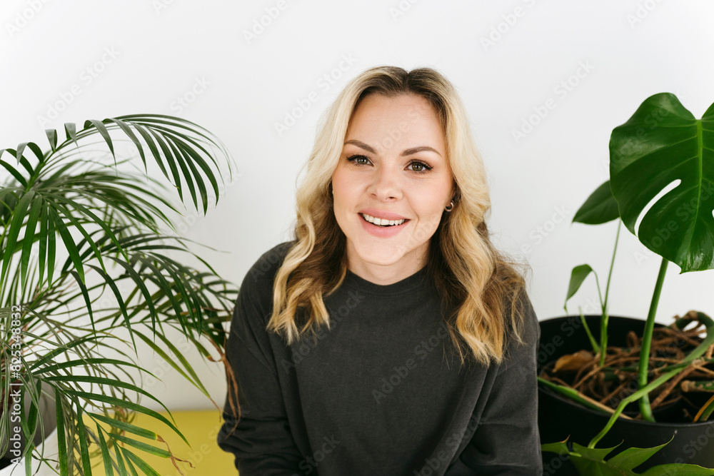Smiling Woman in Casual Attire Indoors Smiling Woman in Casual Attire Indoors