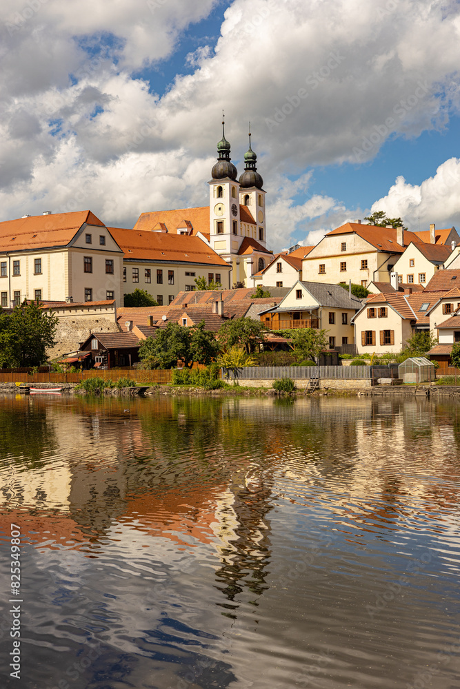 Telc town - historical buildings with lake on foreground Telc town - historical buildings with lake on foreground