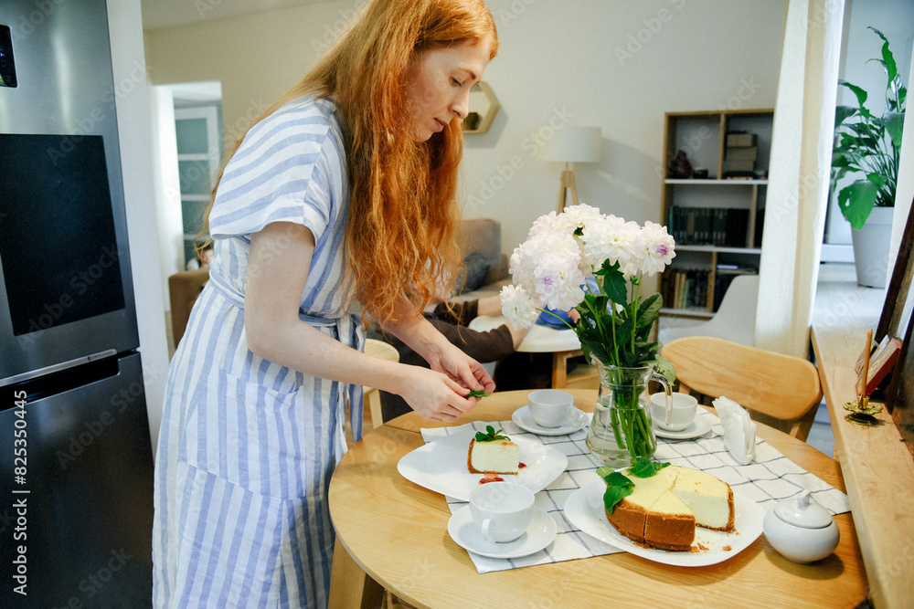  a woman prepares breakfast