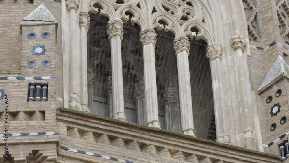 Ornate details of La Seo Cathedral in Zaragoza featuring Gothic and Mudéjar architectural elements Ornate details of La Seo Cathedral in Zaragoza featuring Gothic and Mudéjar architectural elements