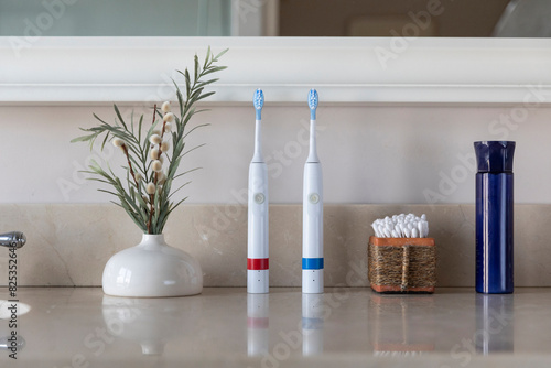 Electric Toothbrush still life with cotton swabs photo