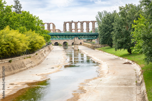 Arroyo de Albarregas with a view to Aqueduct of Miracles (acueducto romano de Los Milagros) in Merida, Province of Badajoz, Extremadura, Spain photo
