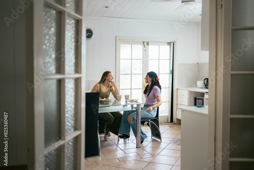 LGBTQ couple in a Queenslander house in Australia photo