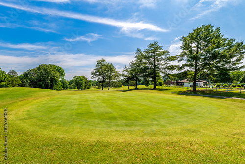 Golf Course Club Green on Sunny Summer Day