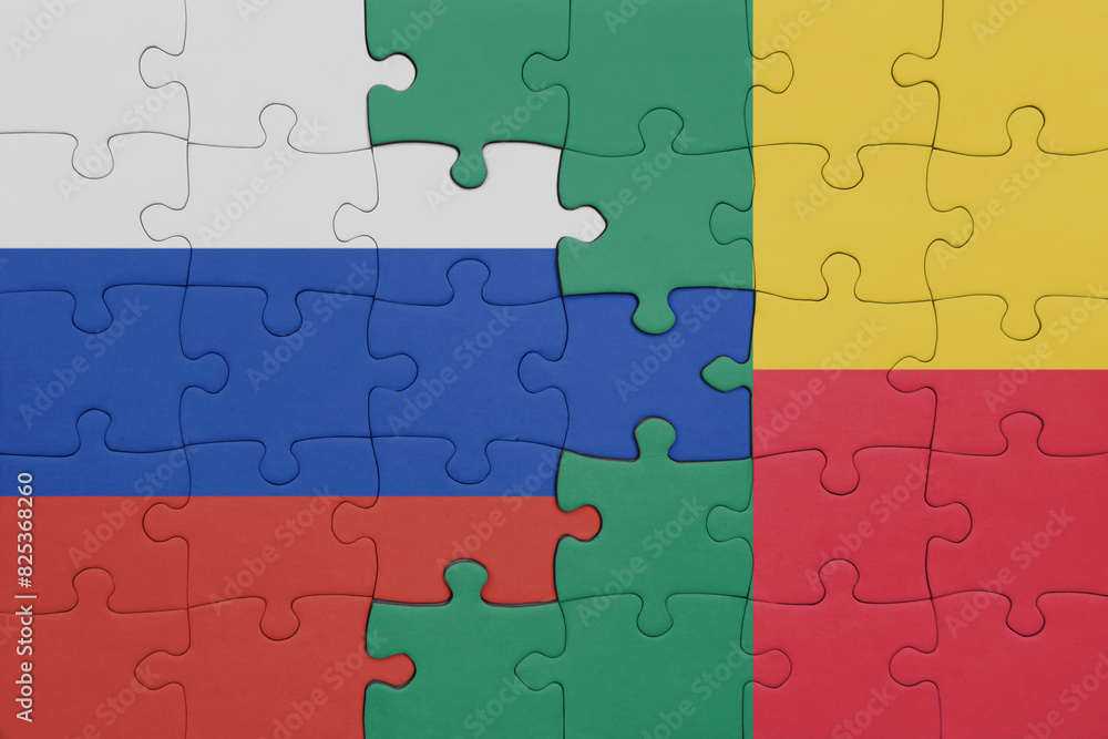 puzzle with the colourful national flag of benin and flag of russia. puzzle with the colourful national flag of benin and flag of russia.