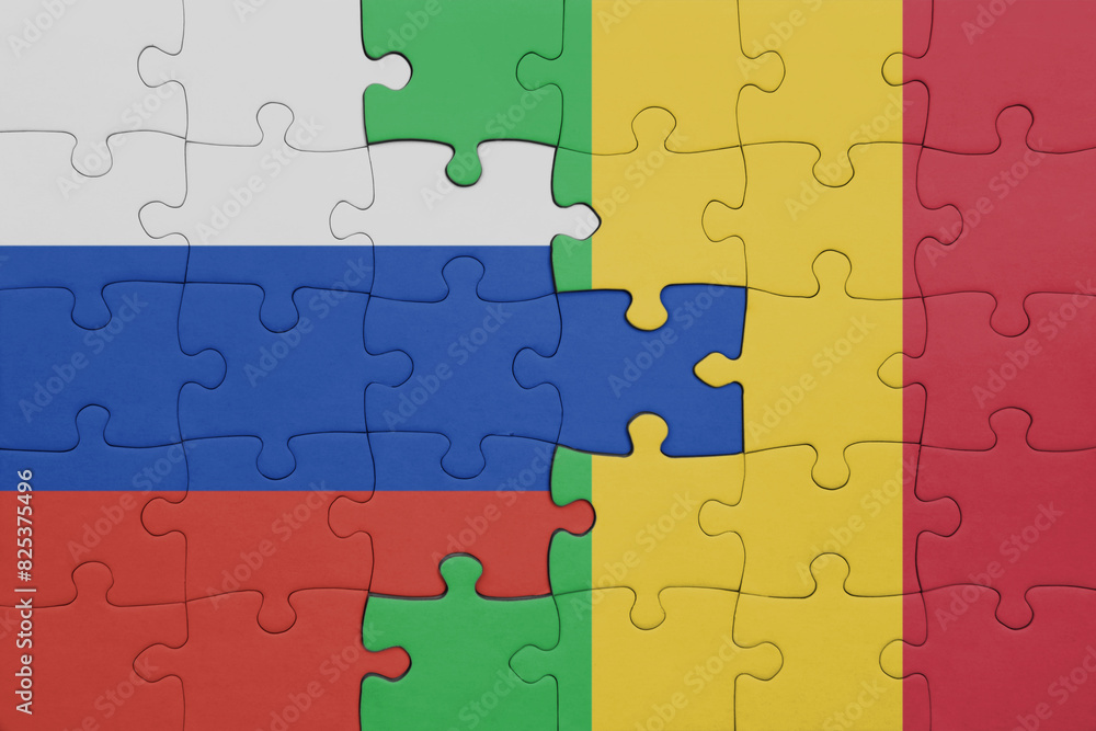 puzzle with the colourful national flag of mali and flag of russia. puzzle with the colourful national flag of mali and flag of russia.