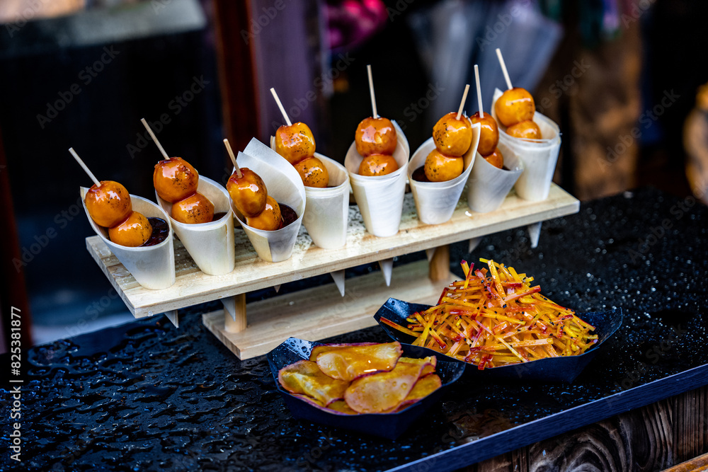 Fototapeta premium Japanese street food snacks available for purchase in Kyoto, Japan