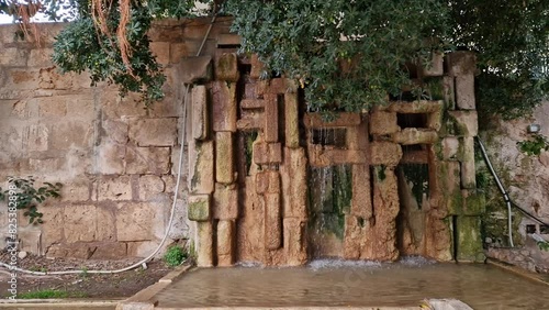 Stone fountain in Parc de Sa Quarantena in daytime in Passeig Maritim, Palma, Mallorca, Spain photo