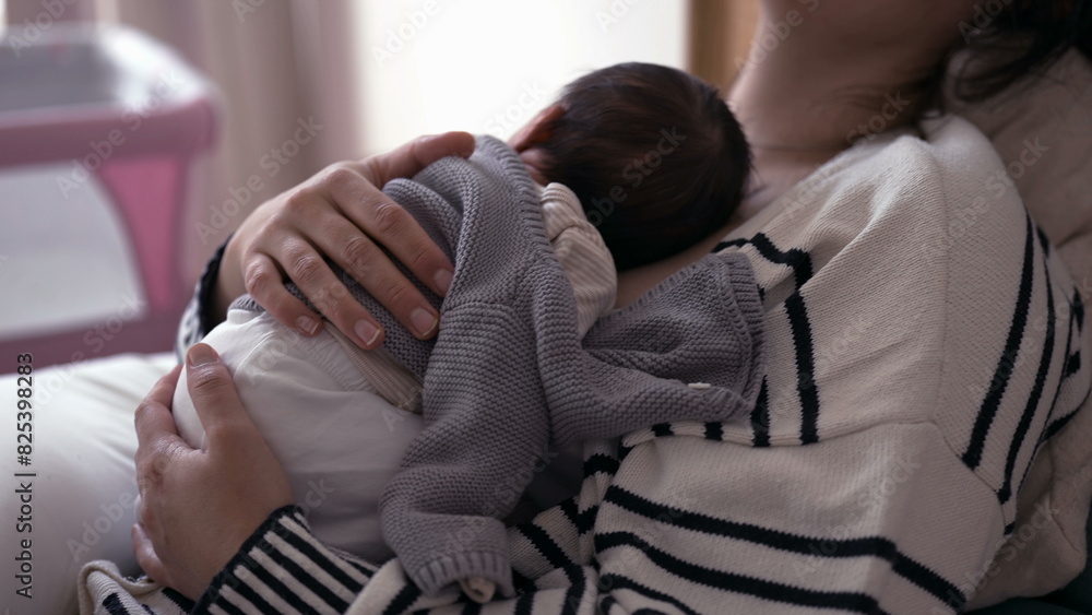 Affectionate Maternal Scene - Exhausted Mother in Bed, Holding Newborn on Chest in First Week of Life Affectionate Maternal Scene - Exhausted Mother in Bed, Holding Newborn on Chest in First Week of Life