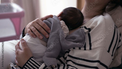 Affectionate Maternal Scene - Exhausted Mother in Bed, Holding Newborn on Chest in First Week of Life