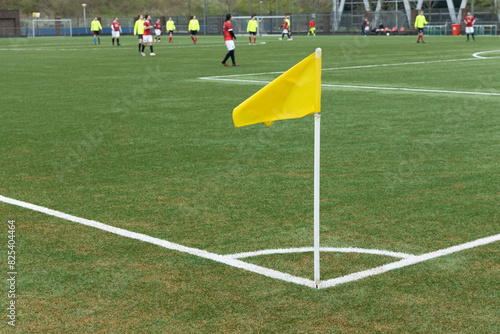 yellow flag at corner of soccer field
