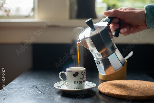 Freshly brewed espresso photo