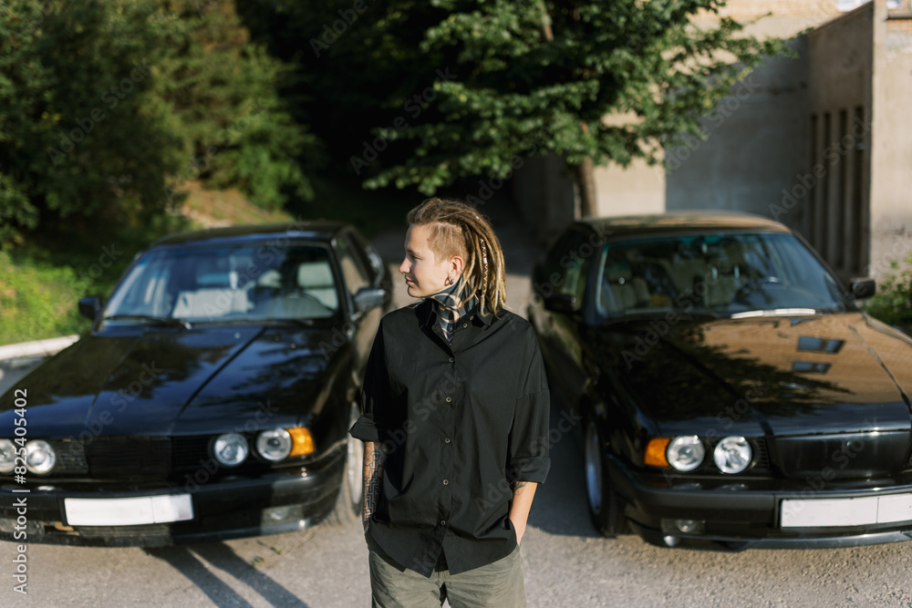 Cool young woman wearing black shirt outdoors Cool young woman wearing black shirt outdoors