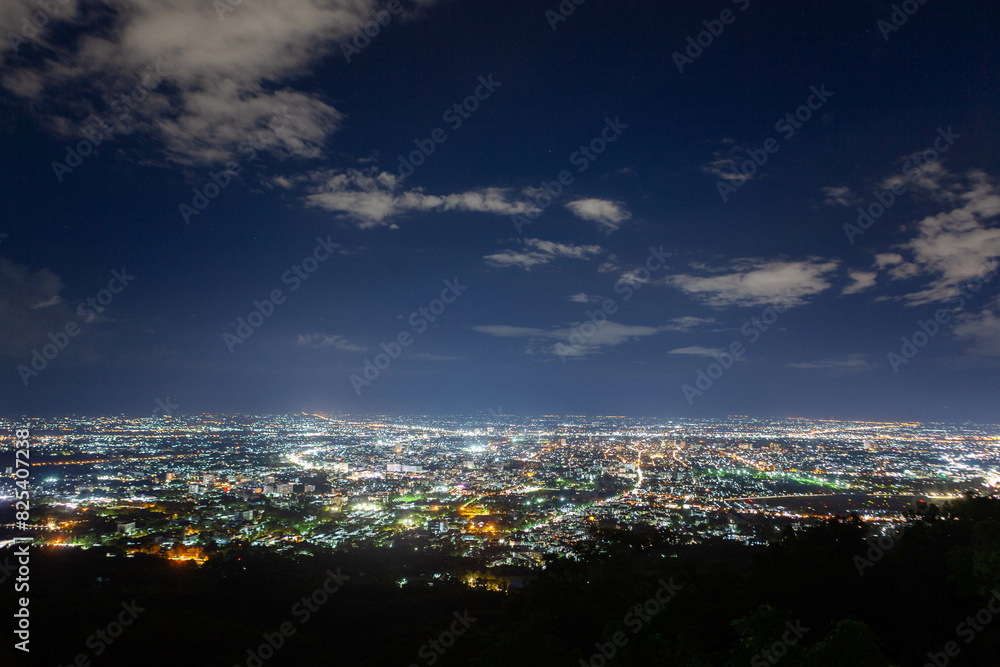 Chiang Mai at night. View from Chaloem Phra Kiat Pavilion Viewpoint on the way to Doi Suthep temple on the slopes of Doi Pui mountain. Chiang Mai at night. View from Chaloem Phra Kiat Pavilion Viewpoint on the way to Doi Suthep temple on the slopes of Doi Pui mountain.