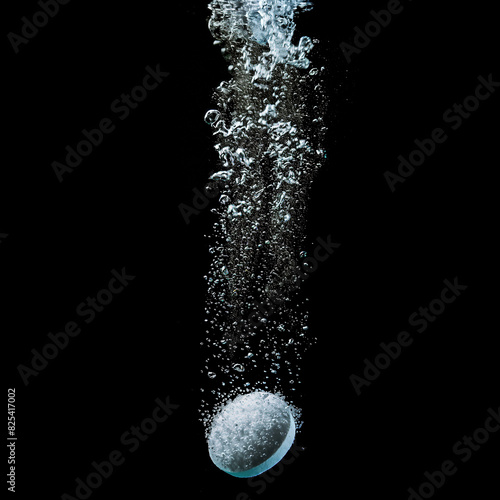 Realistic effervescent pill with fizzy bubbles in water. Soluble tablet dissolving with sparkling fizzy bubbles