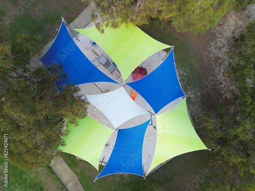 Fototapeta Aerial view of vibrant playground with shade sails in Busselton, Western Austral