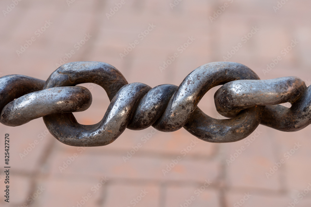 Iron chain with large metal piece Iron chain with large metal piece