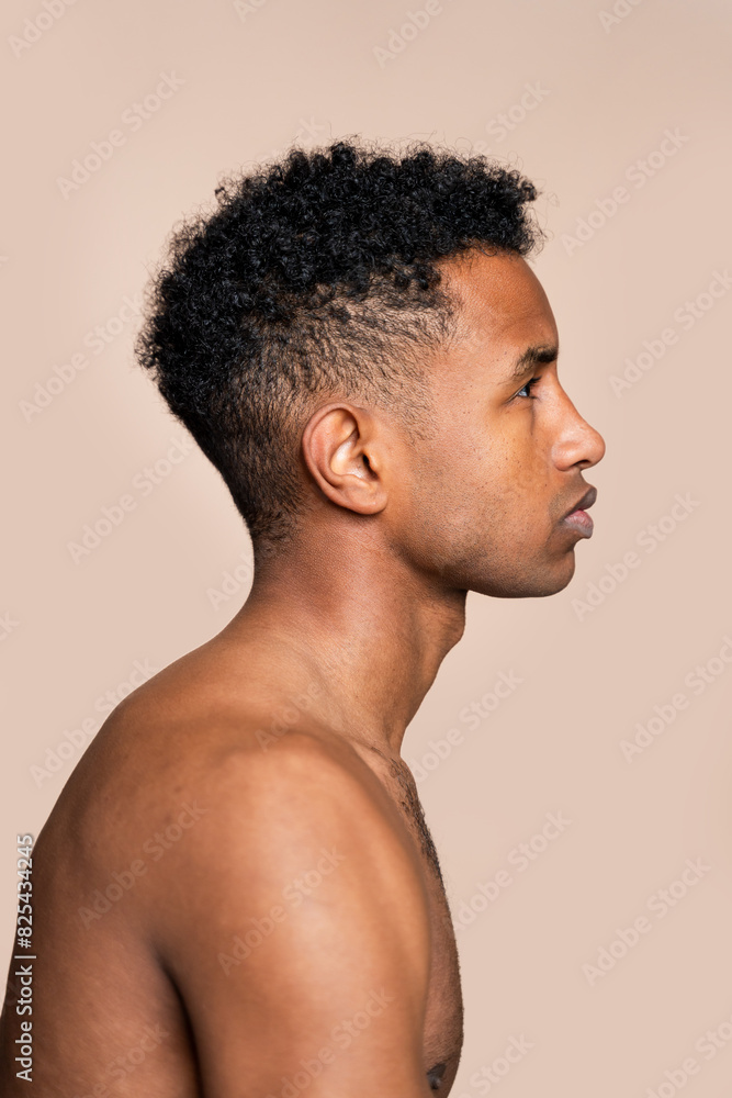 Side profile of a thoughtful young man Side profile of a thoughtful young man