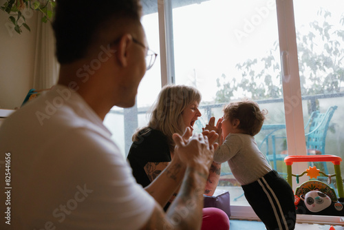Young family enjoying time together at home photo