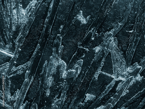 Abstract dark background with ice forming photo