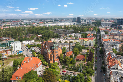 Obraz na płótnie Summer skyline cityscape of district Wilda in Poznan, Poland. Wide panoramic aerial view. Poznań University of Technology building (Politechnika Poznańska) in the foreground. w salonie