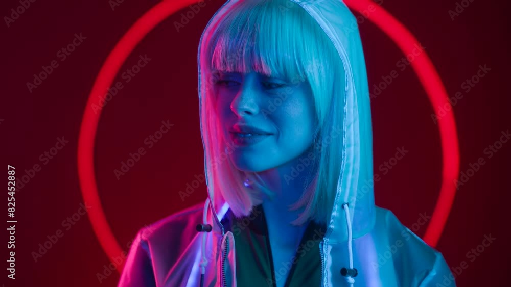 Woman in futuristic costume. Female in modern VR glasses interacting with network while having virtual reality experience. Augmented reality game, future technology.