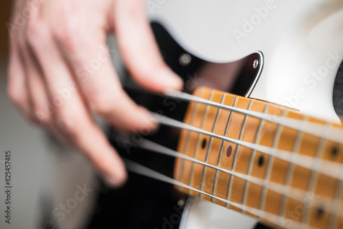 Playing electric bass guitar photo