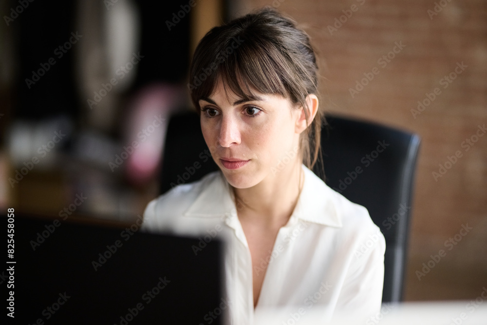 Woman working on laptop Woman working on laptop