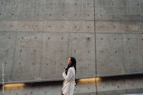 a single woman walks around a big city