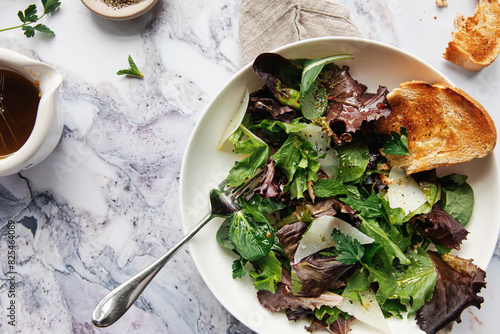lightly dressed spring salad greens