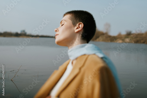 Serene portrait of woman with closed eyes photo