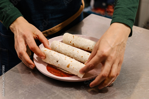 Savoring Traditional Georgian Kababi Rolls, Rustic Kitchen Setting photo