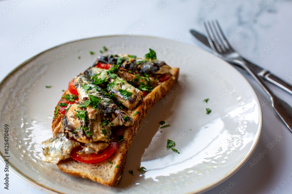 Toasted bread with tomatoes and sardines Toasted bread with tomatoes and sardines