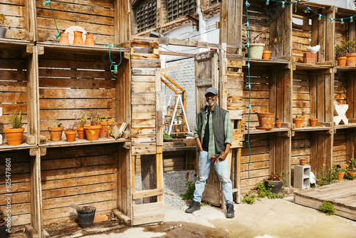 Man working in an urban community garden photo