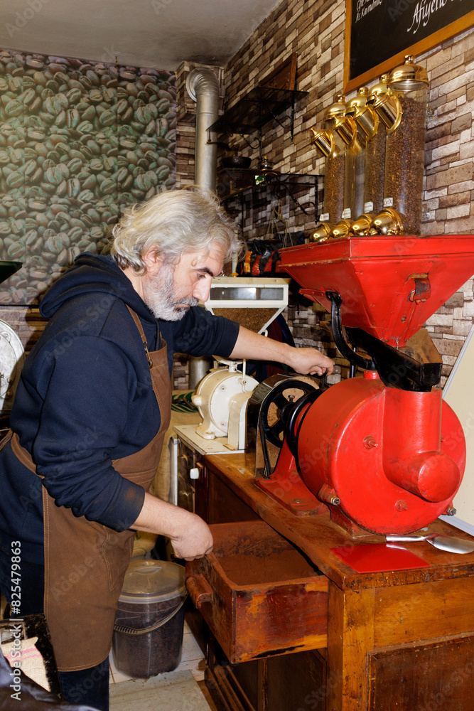 barista grinds coffee beans barista grinds coffee beans