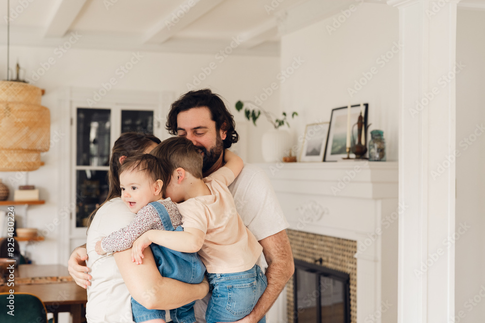 portrait of a family hugging. group hug portrait of a family hugging. group hug