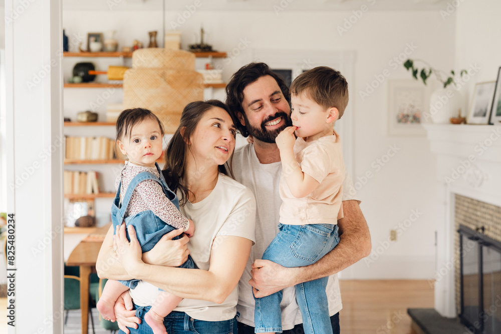 portrait of happy family in dining room . portrait of happy family in dining room .