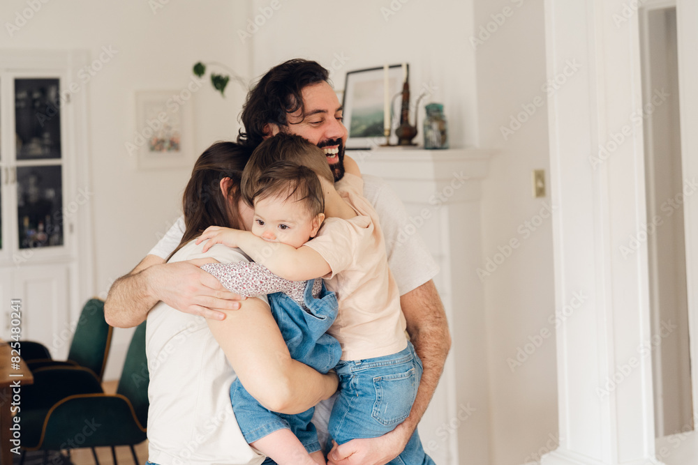 portrait of a family hugging. group hug portrait of a family hugging. group hug