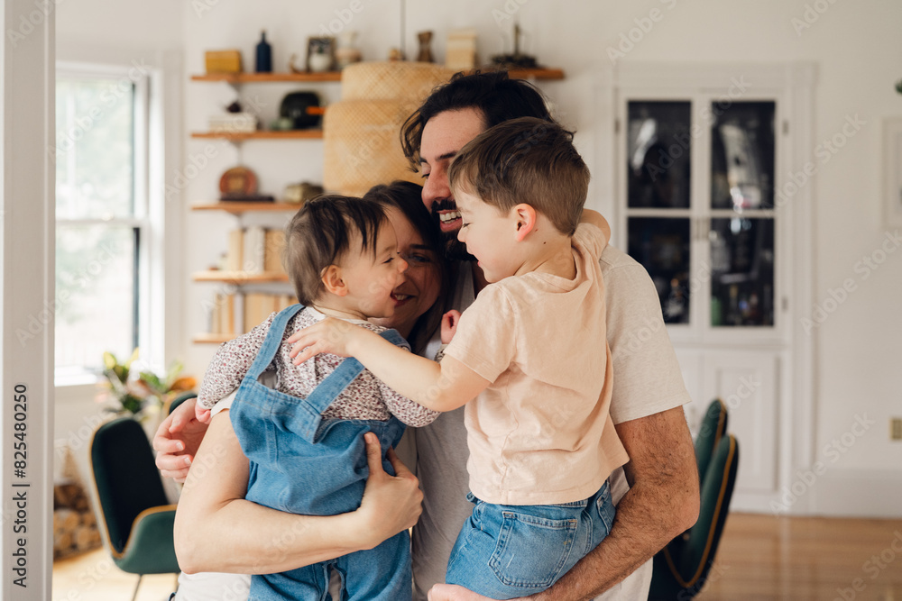 portrait of a family hugging. group hug 