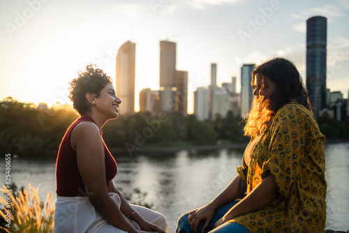Young Indian women watching the sunset in Brisbane, Australia photo