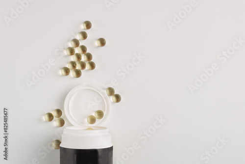 Wallpaper Mural transparent capsules spilled out of a jar, medicine, dietary supplement, isolate on white, copy space Torontodigital.ca