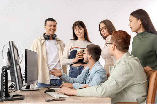 Team of young programmers w...