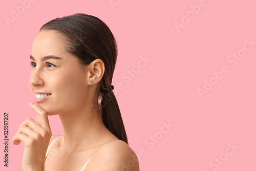 Young smiling woman with ha...