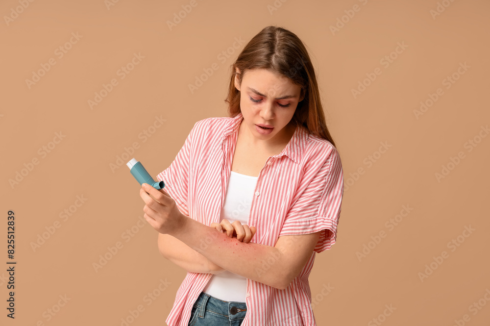 Young woman with skin allergy and inhaler on brown background Young woman with skin allergy and inhaler on brown background