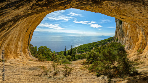 Canvas Print Spectacular cave in the mountainside with a beautiful view of the Adriatic Sea